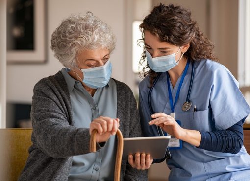 Doctor,And,Senior,Woman,Going,Through,Medical,Record,On,Digital